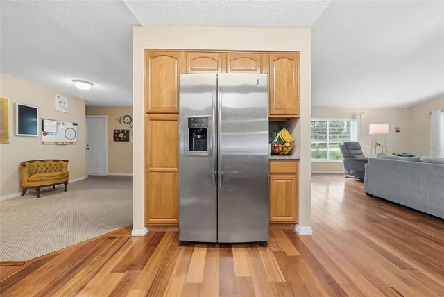 a bed room with a bed and a large mirror