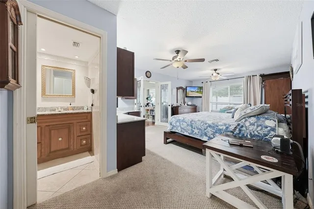 a living room with fireplace furniture and a window