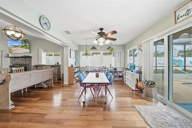 an aerial view of residential house with outdoor space and swimming pool