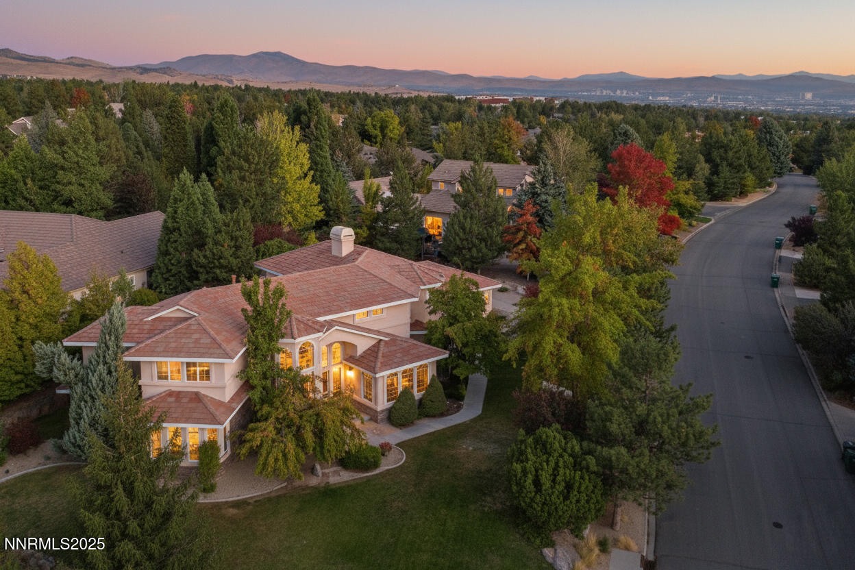 14535 South Quiet Reno, NV 89511 - Photo 1 of 40 an aerial view of a house with mountain view