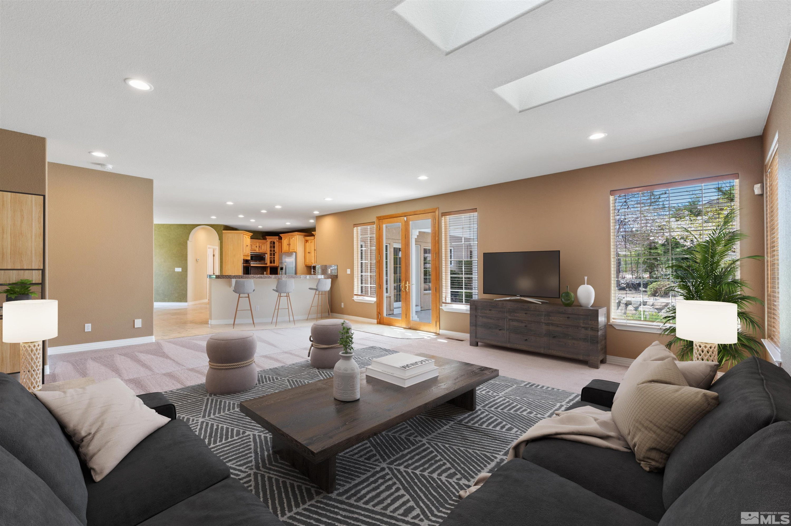 14535 South Quiet Reno, NV 89511 - Photo 12 of 40 a living room with furniture and a large window