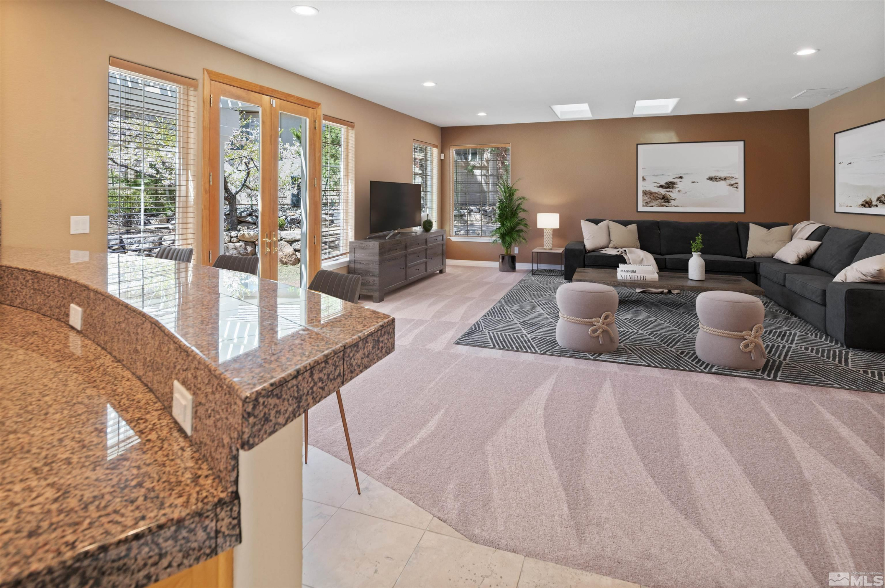14535 South Quiet Reno, NV 89511 - Photo 10 of 40 a living room with furniture and large windows