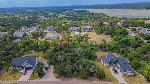 an aerial view of a house with a garden