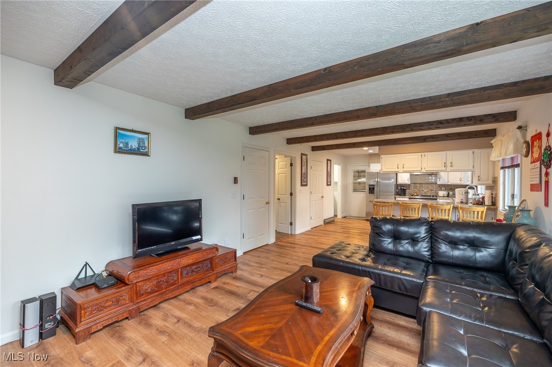 1407 Olde Post Road Ashland, OH 44805 - Photo 10 of 41 Living room with open kitchen