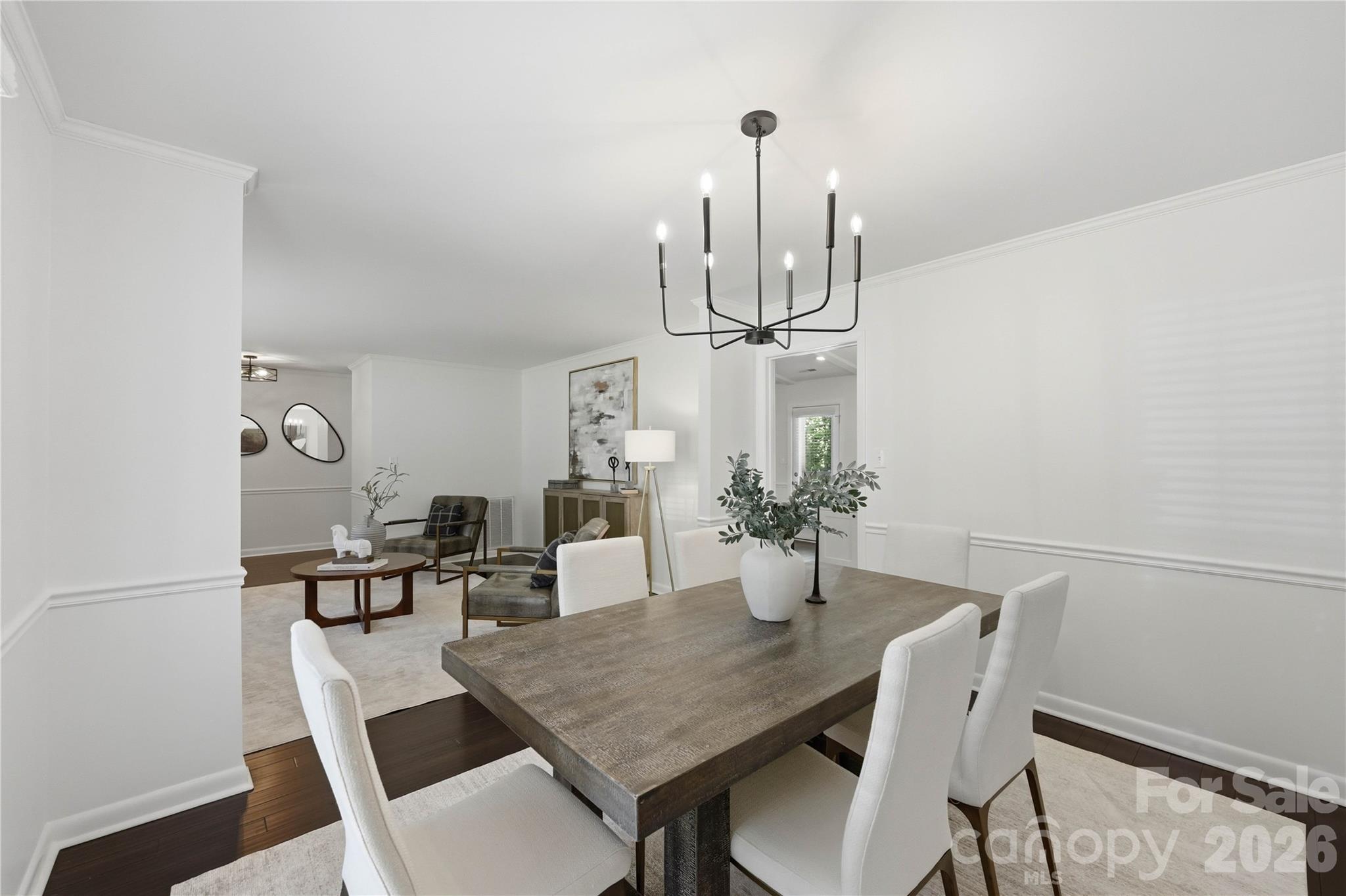 341 Neill Ridge Road Matthews, NC 28105 - Photo 11 of 36 a view of a dining room with furniture and wooden floor
