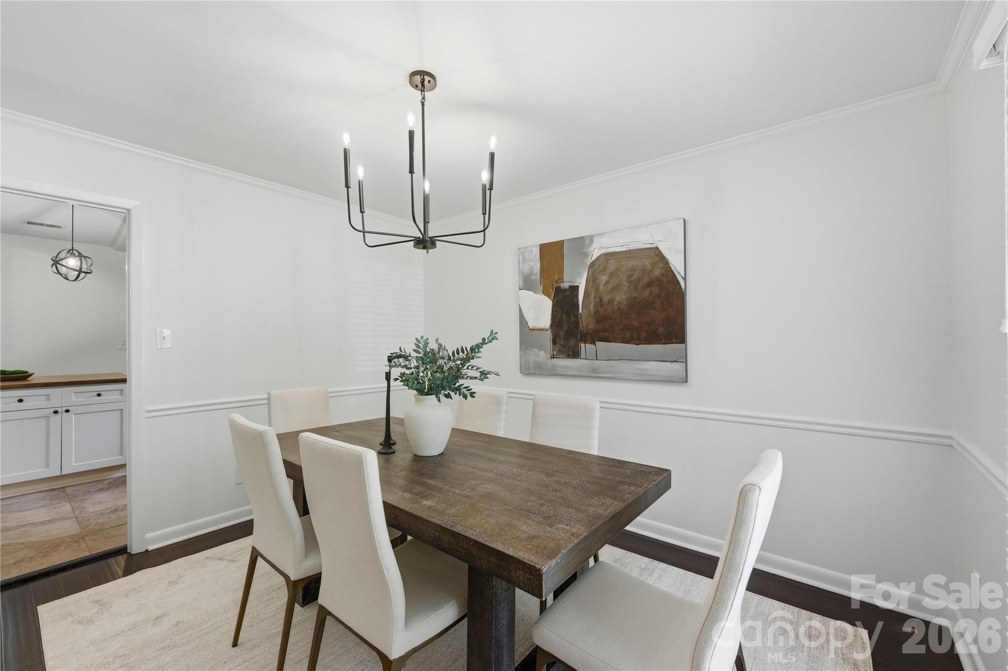 341 Neill Ridge Road Matthews, NC 28105 - Photo 12 of 36 a view of a dining room with furniture and wooden floor