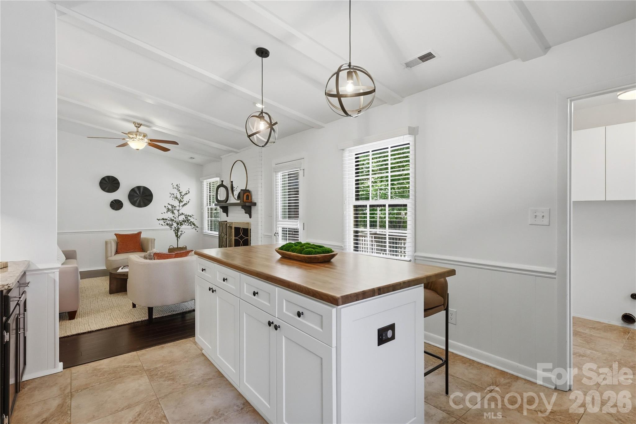 341 Neill Ridge Road Matthews, NC 28105 - Photo 18 of 36 a view of a kitchen with a table and chairs