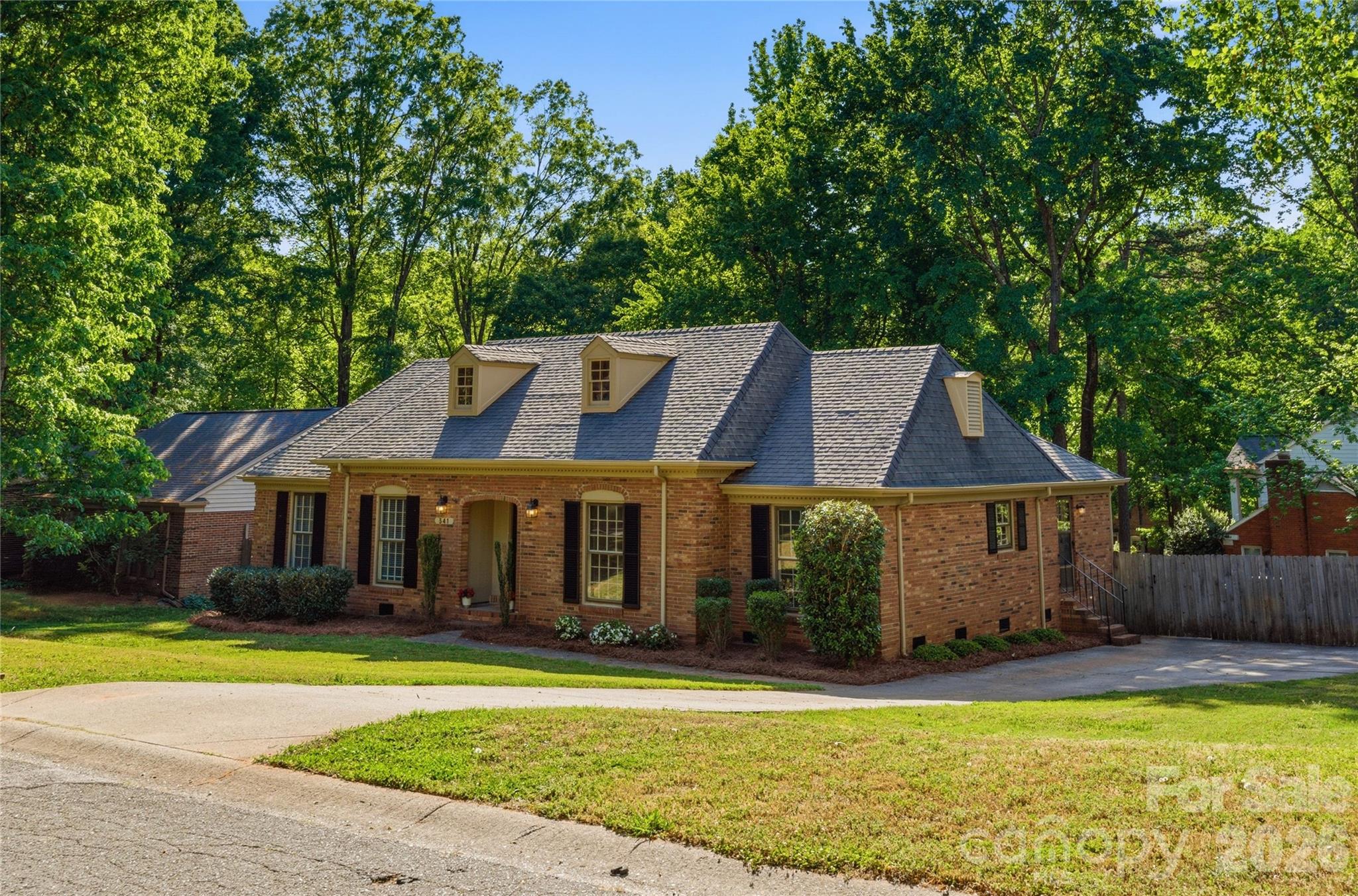 341 Neill Ridge Road Matthews, NC 28105 - Photo 2 of 36 a front view of a house with a yard