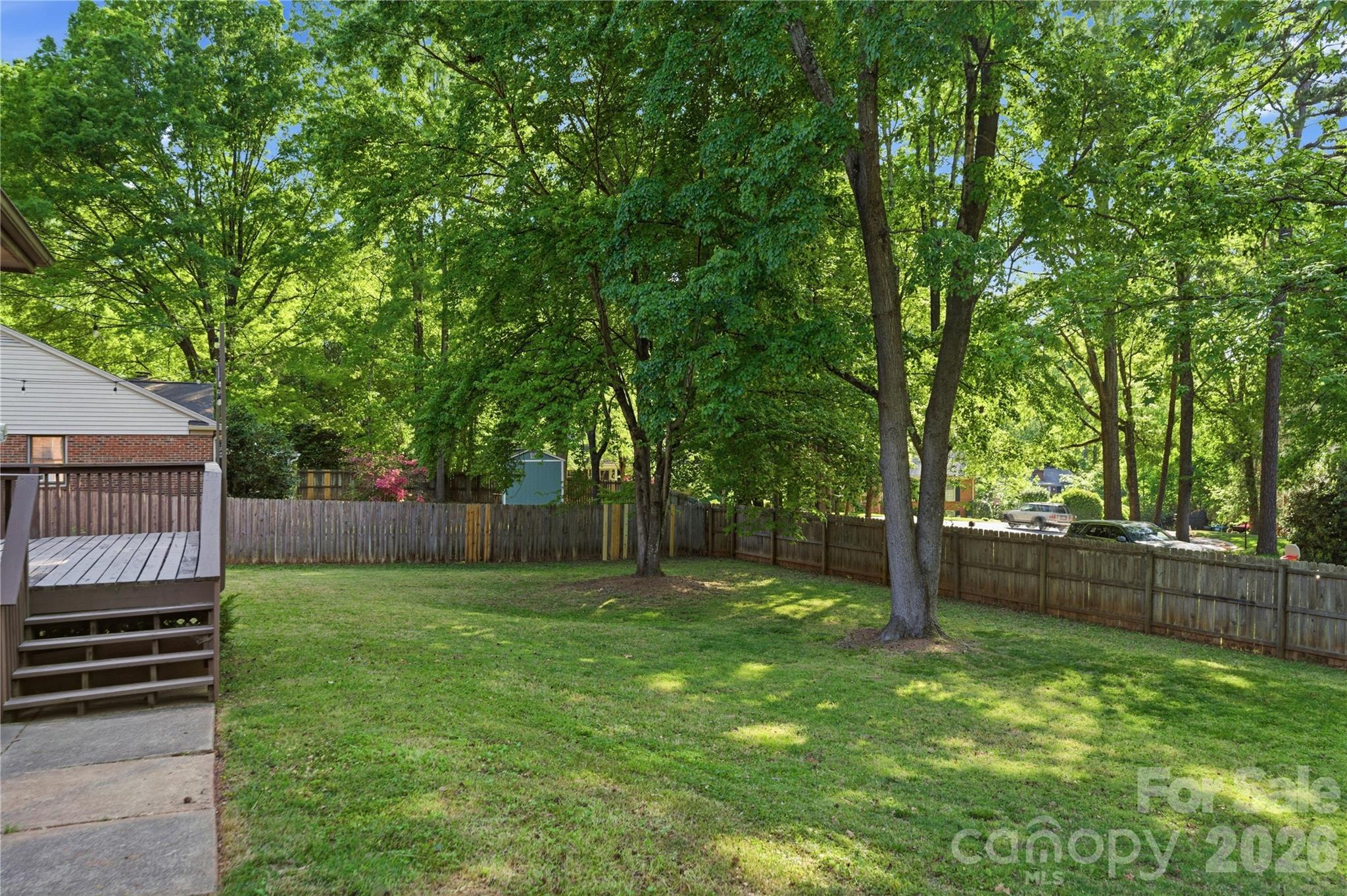 341 Neill Ridge Road Matthews, NC 28105 - Photo 3 of 36 a view of a backyard with a trees