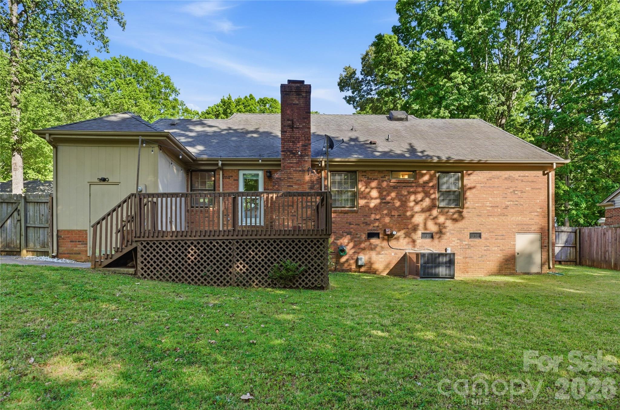 341 Neill Ridge Road Matthews, NC 28105 - Photo 34 of 36 a front view of a house with garden
