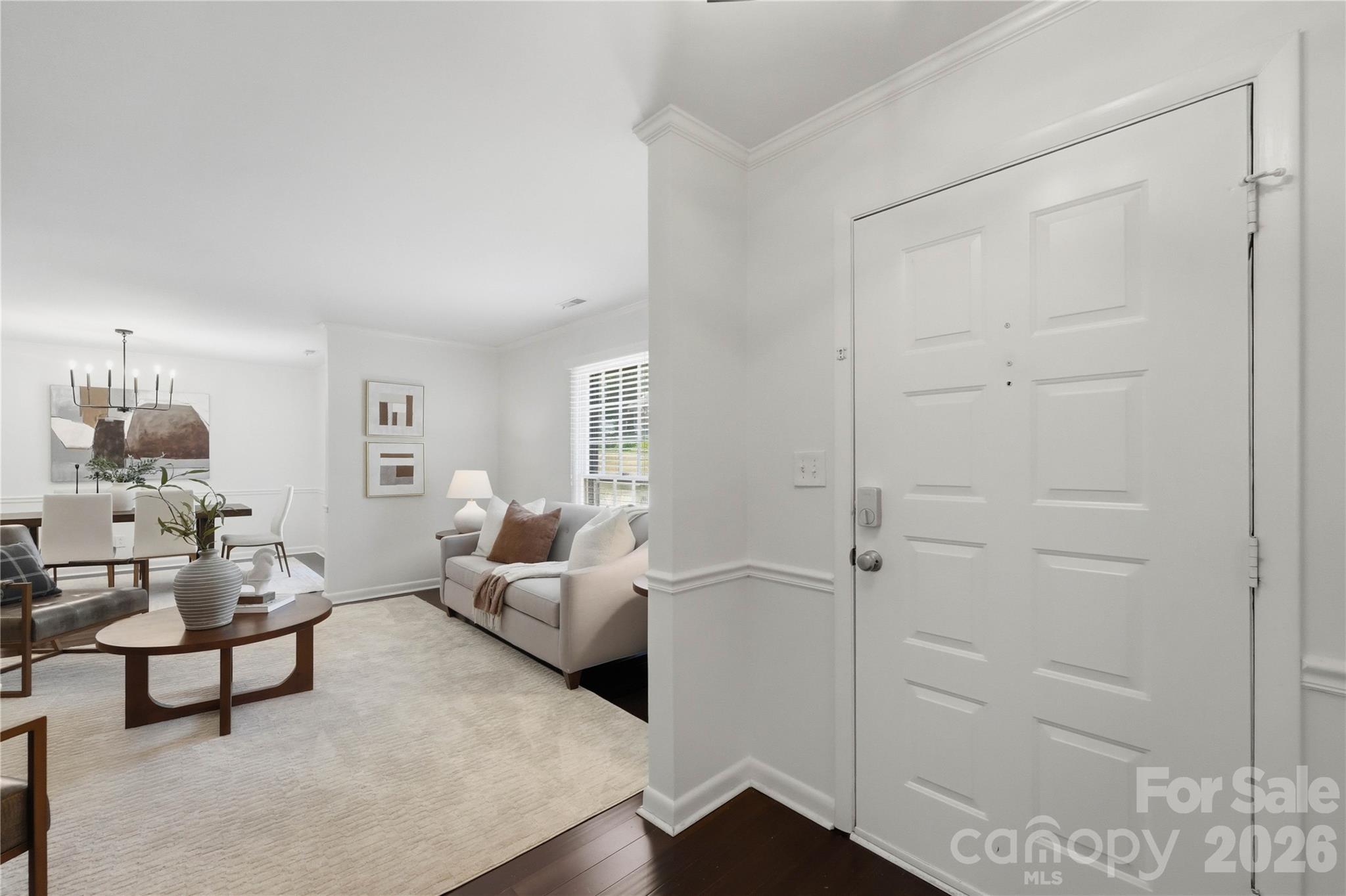 341 Neill Ridge Road Matthews, NC 28105 - Photo 5 of 36 a living room with furniture and wooden floor
