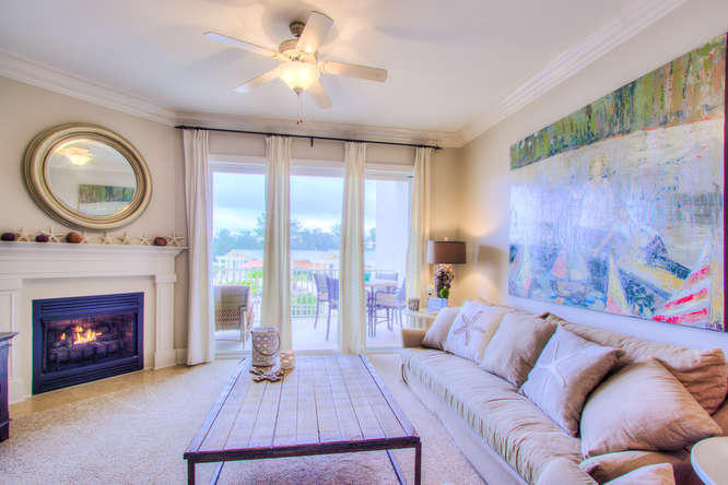1653 West County Highway 30A, Unit 1116 Santa Rosa Beach, FL 32459 - Photo 12 of 41 a living room with furniture and a fireplace