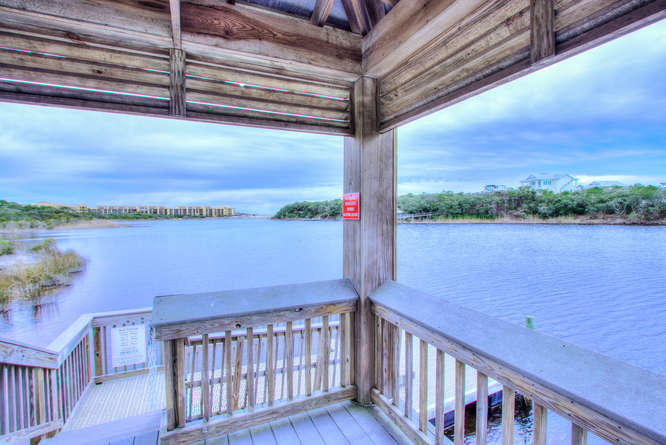 1653 West County Highway 30A, Unit 1116 Santa Rosa Beach, FL 32459 - Photo 37 of 41 a view of a balcony with lake view and wooden floor