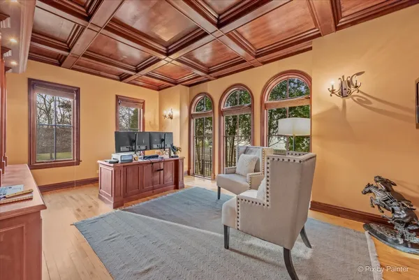 a view of a livingroom with furniture and a flat screen tv