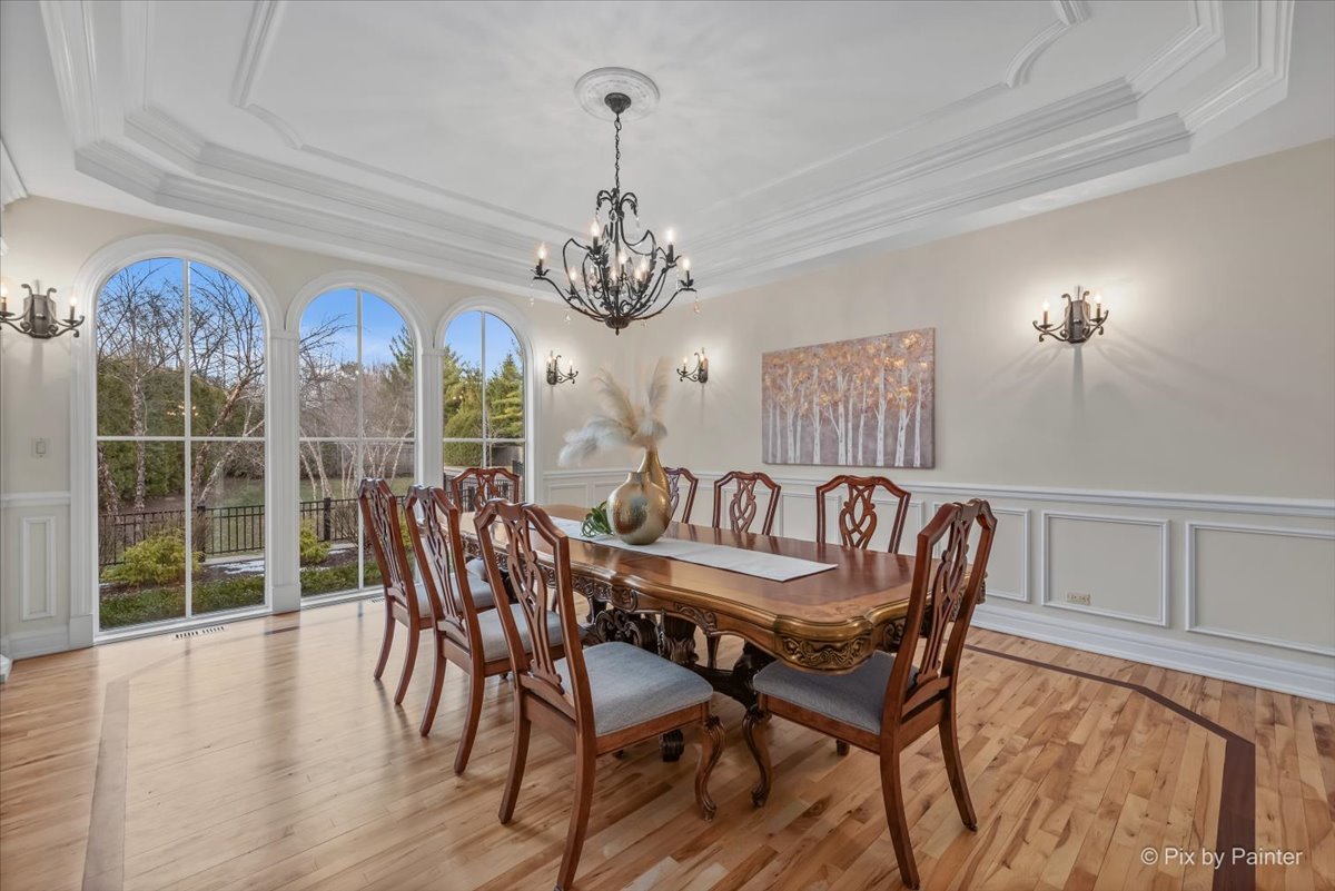 27 West Onwentsia Road Lake Forest, IL 60045 - Photo 13 of 73 a view of a dining room with furniture window and wooden floor