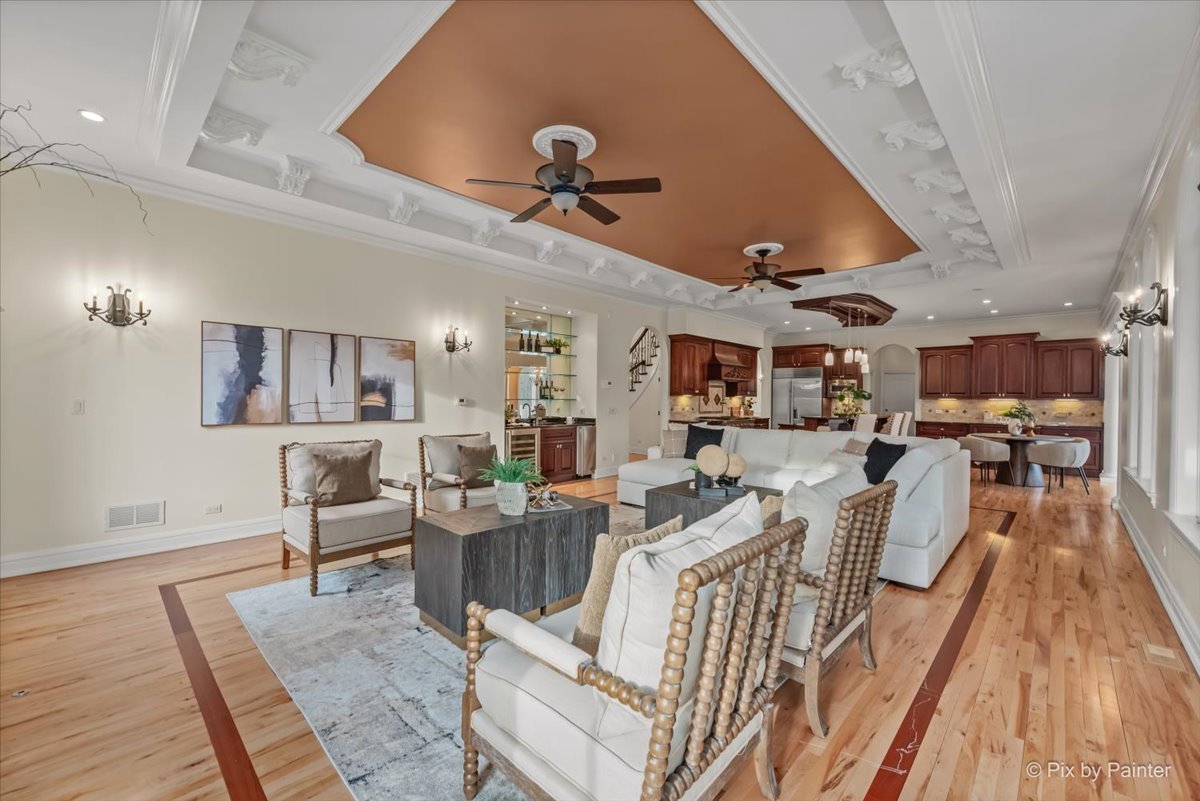 27 West Onwentsia Road Lake Forest, IL 60045 - Photo 26 of 73 a living room with lots of furniture and wooden floor