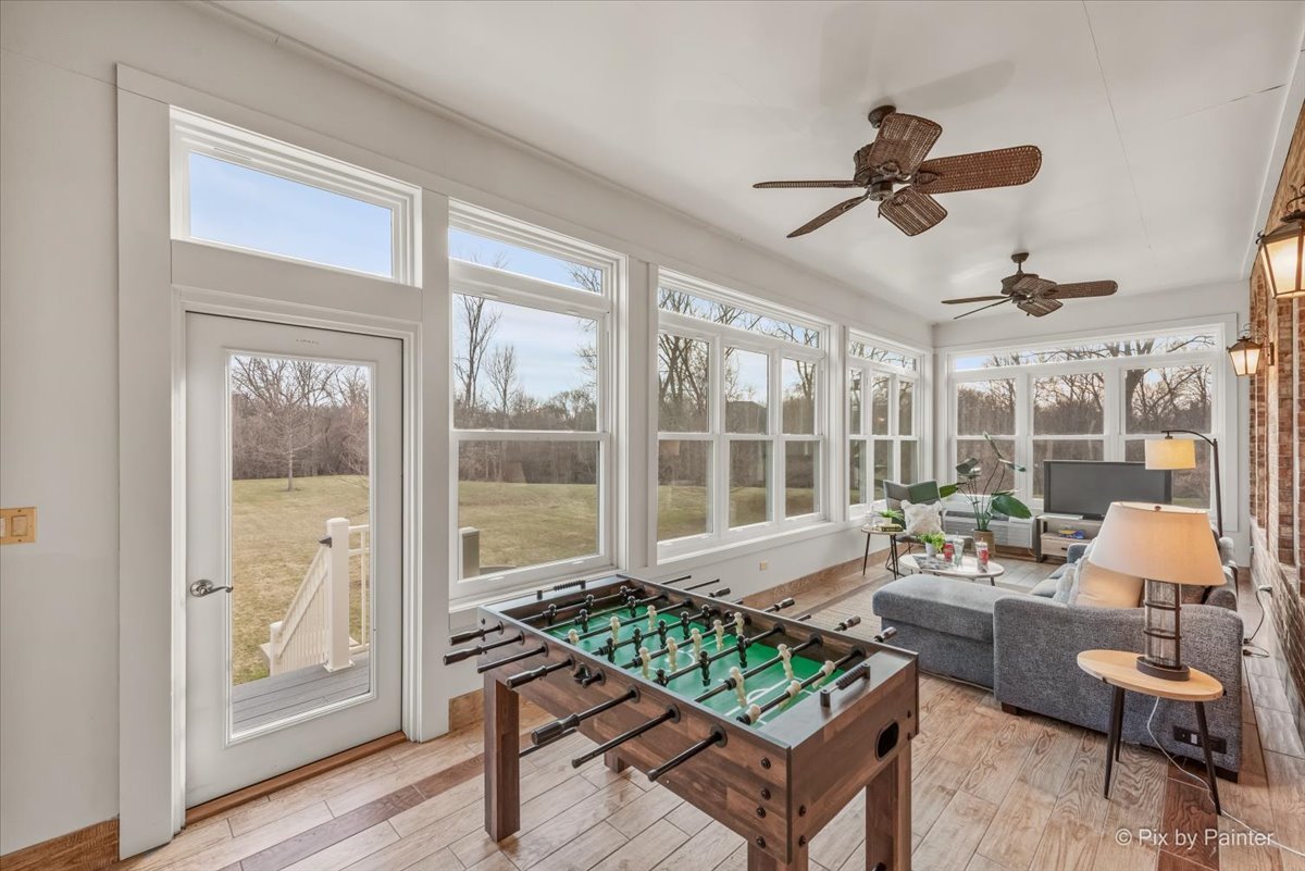 27 West Onwentsia Road Lake Forest, IL 60045 - Photo 30 of 73 a living room with furniture and a large window