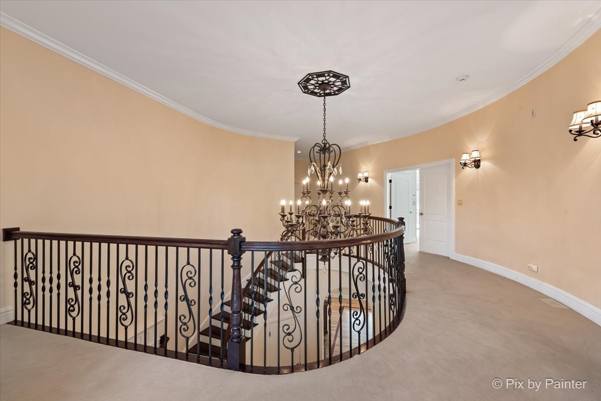 27 West Onwentsia Road Lake Forest, IL 60045 - Photo 35 of 73 a view of entryway and hall with a chandelier
