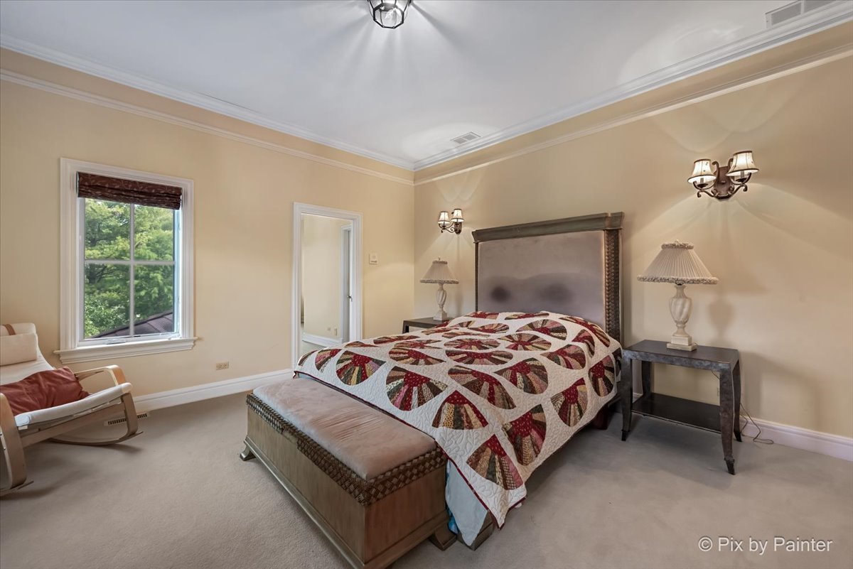 27 West Onwentsia Road Lake Forest, IL 60045 - Photo 37 of 73 a bedroom with a bed and window