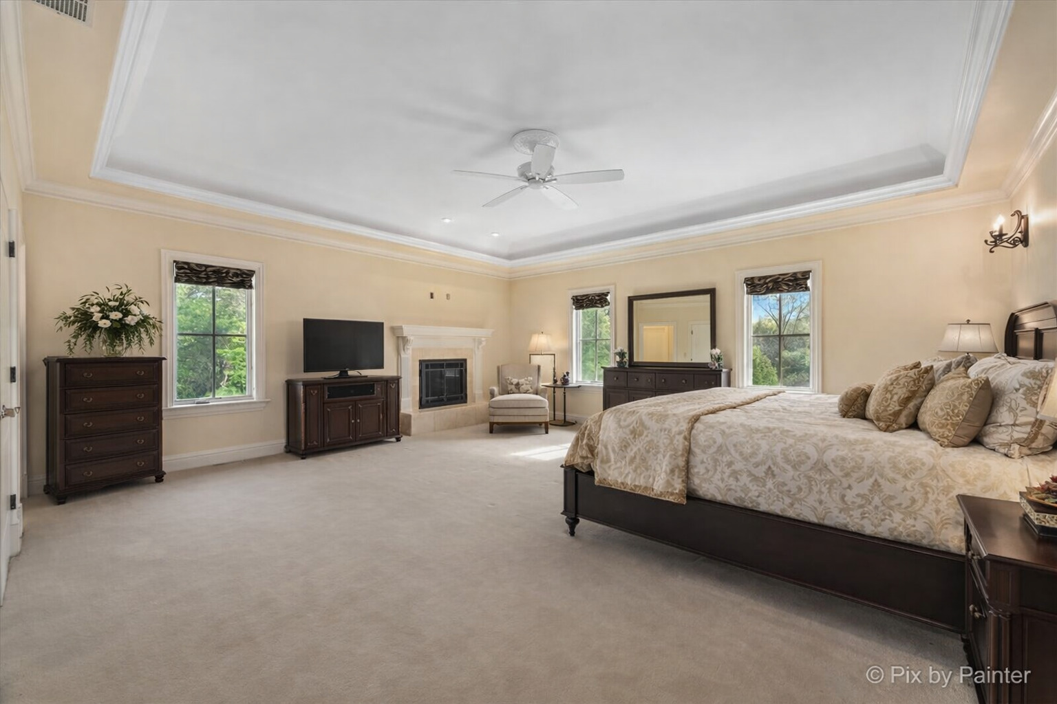 27 West Onwentsia Road Lake Forest, IL 60045 - Photo 46 of 73 a spacious bedroom with a bed and a television