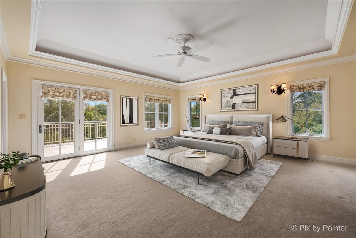 27 West Onwentsia Road Lake Forest, IL 60045 - Photo 50 of 73 a spacious bedroom with a large bed and a large window