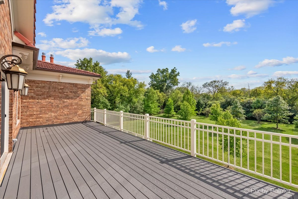 27 West Onwentsia Road Lake Forest, IL 60045 - Photo 55 of 73 a view of a balcony with wooden floor