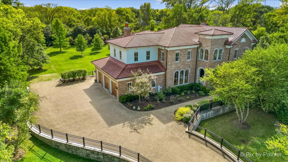 27 West Onwentsia Road Lake Forest, IL 60045 - Photo 61 of 73 an aerial view of a house with swimming pool and garden