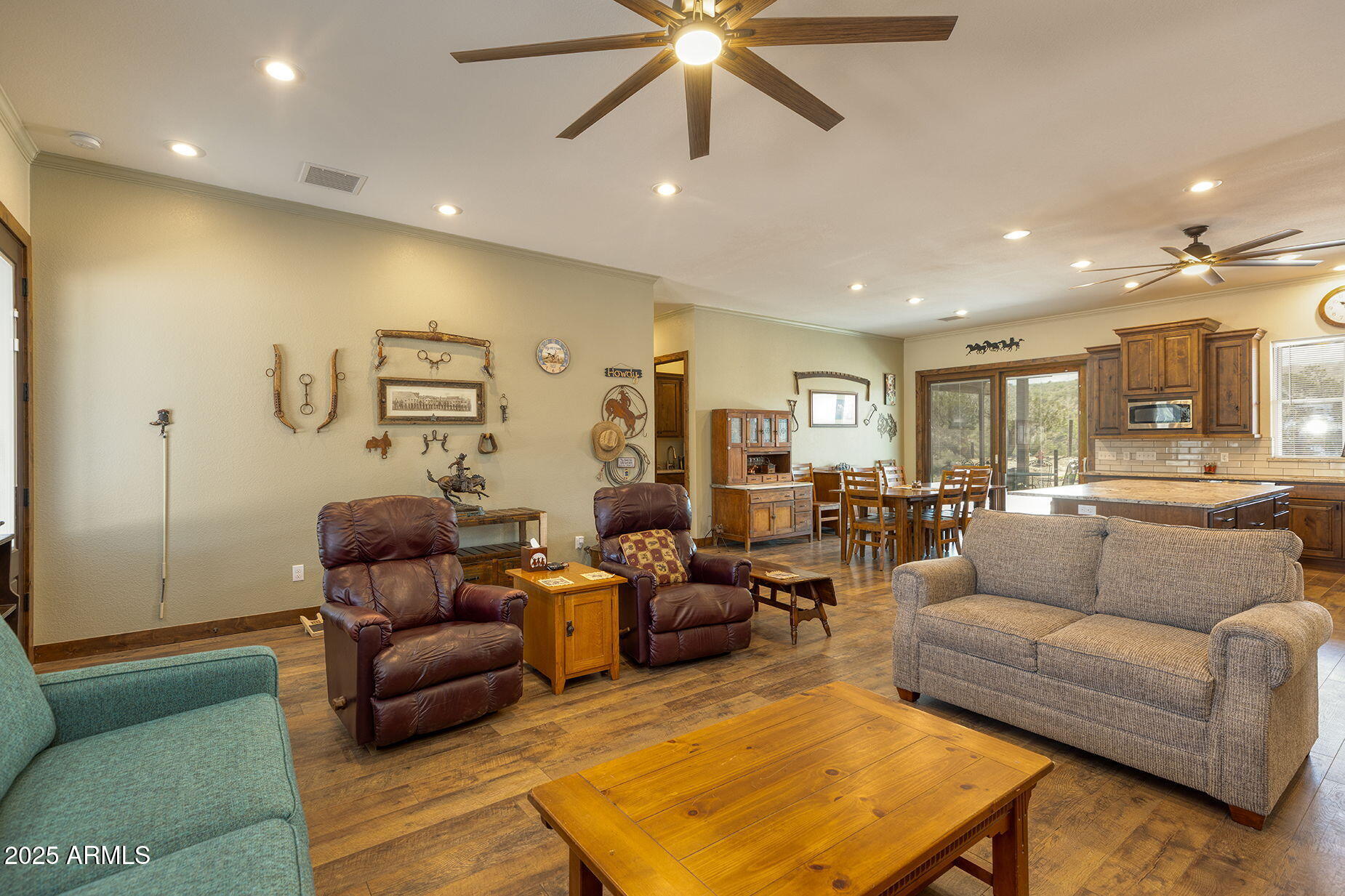 828 North Gun Creek Road Payson, AZ 85541 - Photo 13 of 57 a living room with furniture kitchen view and a chandelier