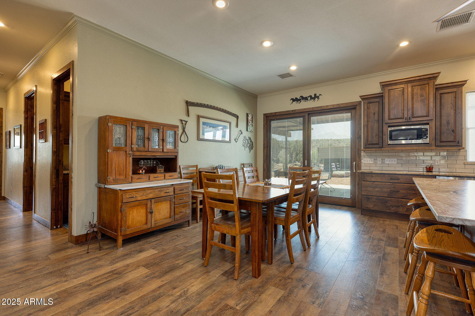 828 North Gun Creek Road Payson, AZ 85541 - Photo 14 of 57 a view of a dining room with furniture window and wooden floor