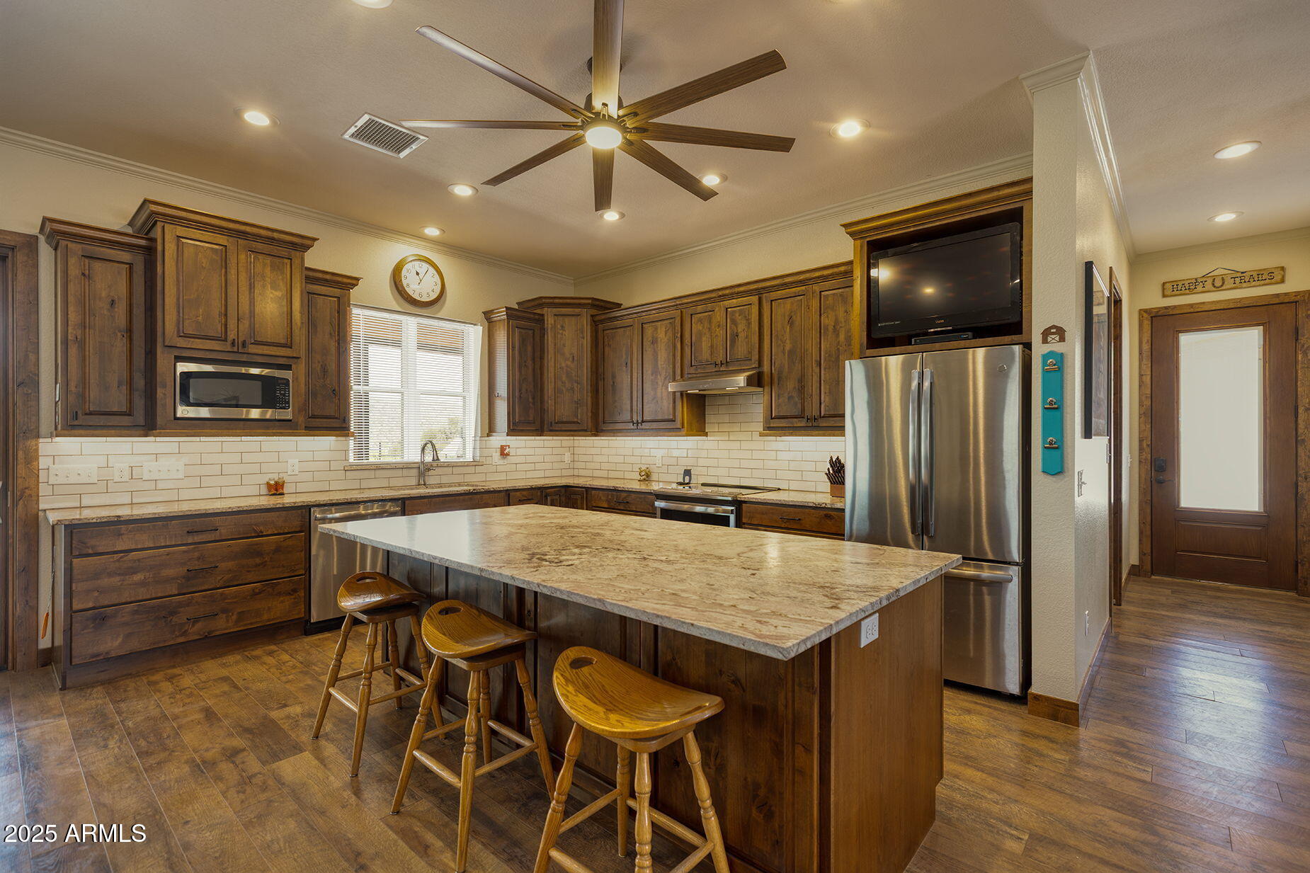 828 North Gun Creek Road Payson, AZ 85541 - Photo 15 of 57 a kitchen with cabinets and stainless steel appliances