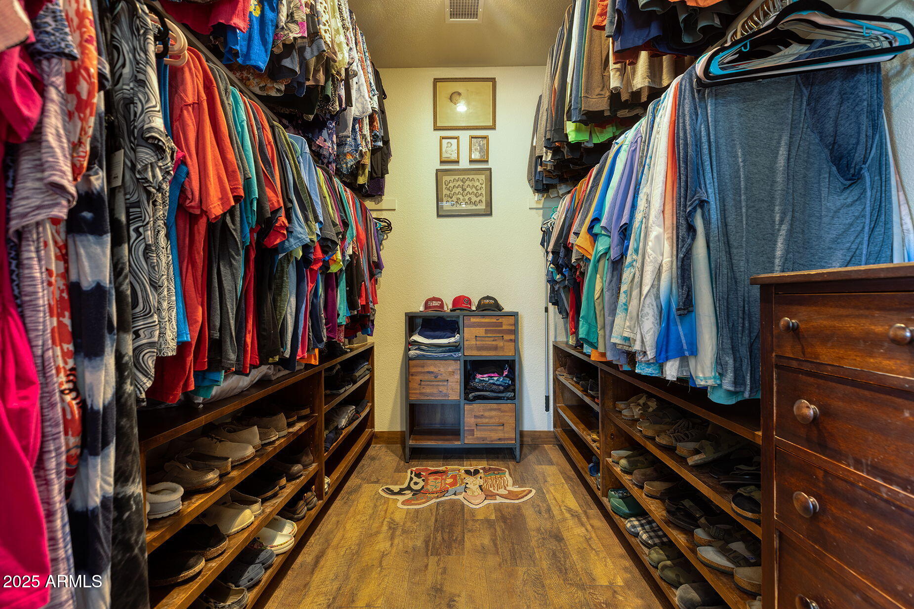 828 North Gun Creek Road Payson, AZ 85541 - Photo 20 of 57 a view of walk in closet with clothes and shoes