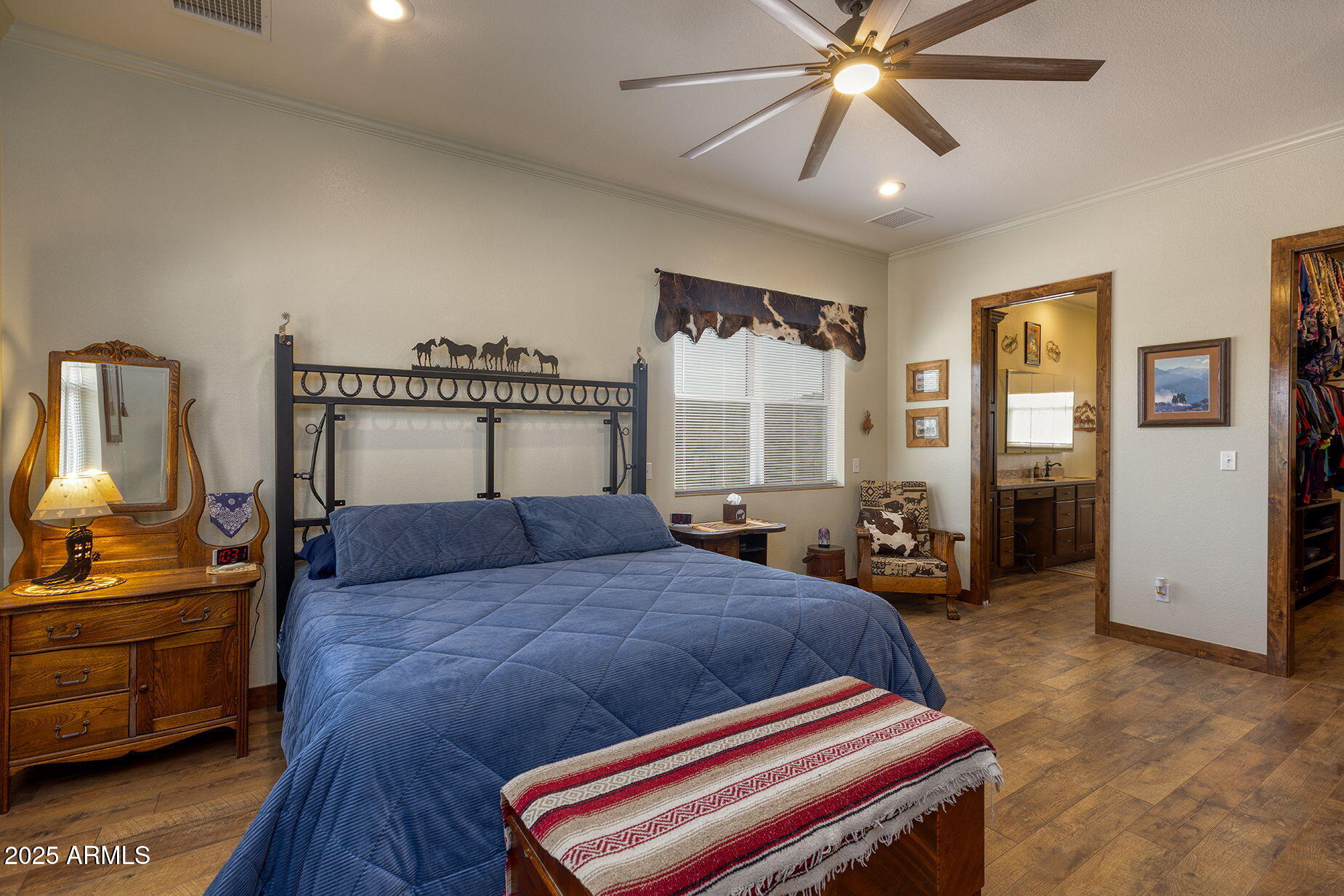828 North Gun Creek Road Payson, AZ 85541 - Photo 22 of 57 a bedroom with a bed and wooden floor