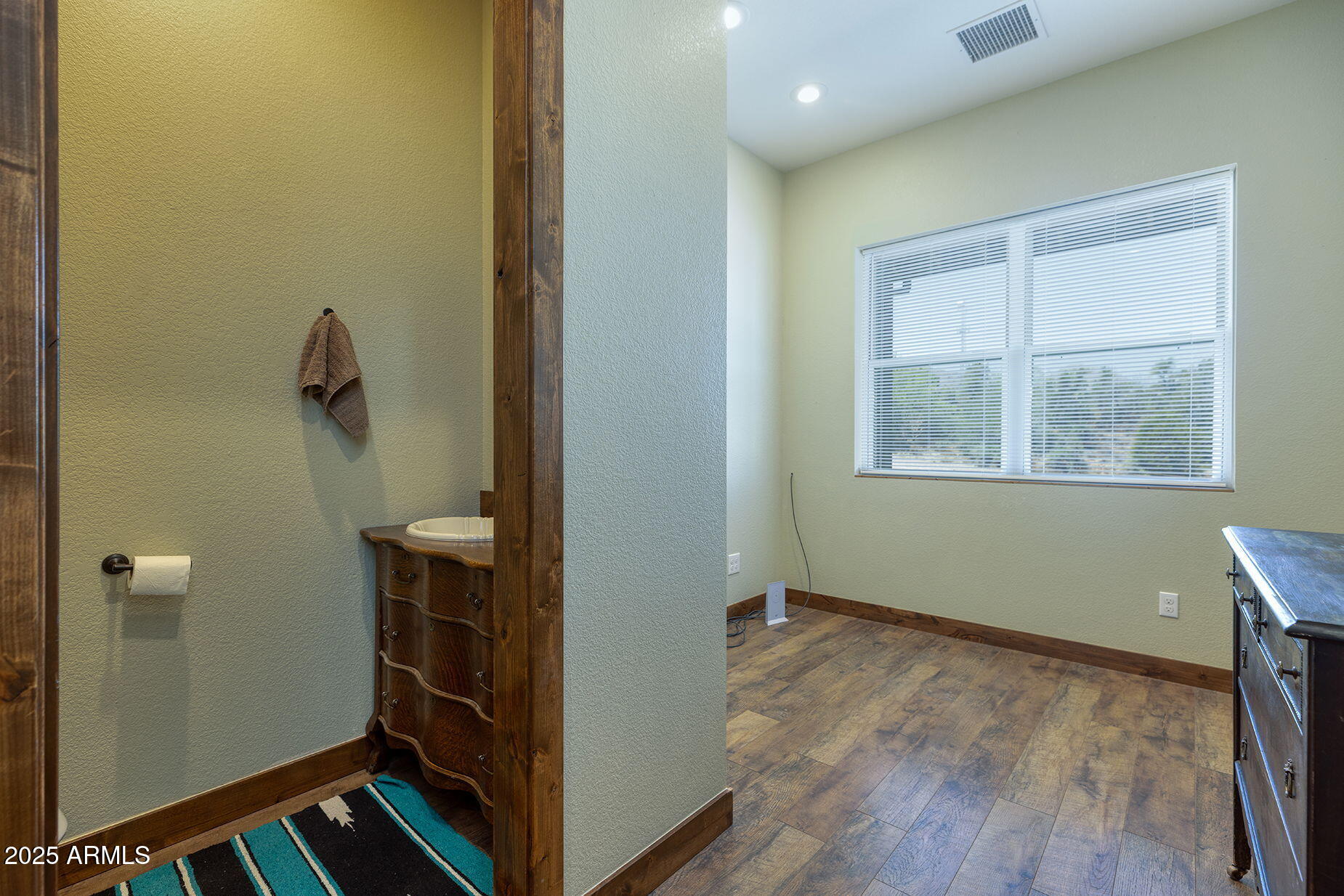 828 North Gun Creek Road Payson, AZ 85541 - Photo 30 of 57 a view of room with window and wooden floor