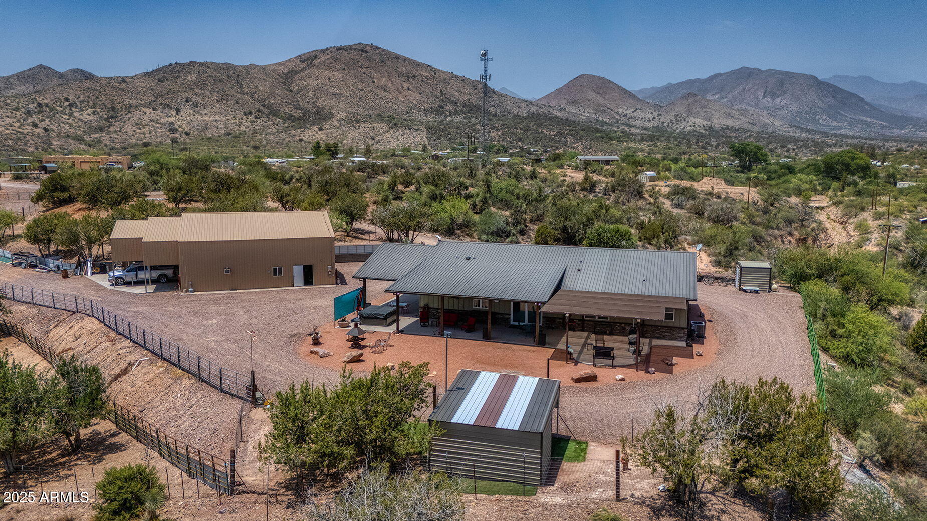 828 North Gun Creek Road Payson, AZ 85541 - Photo 53 of 57 an aerial view of a house with outdoor space and a mountain