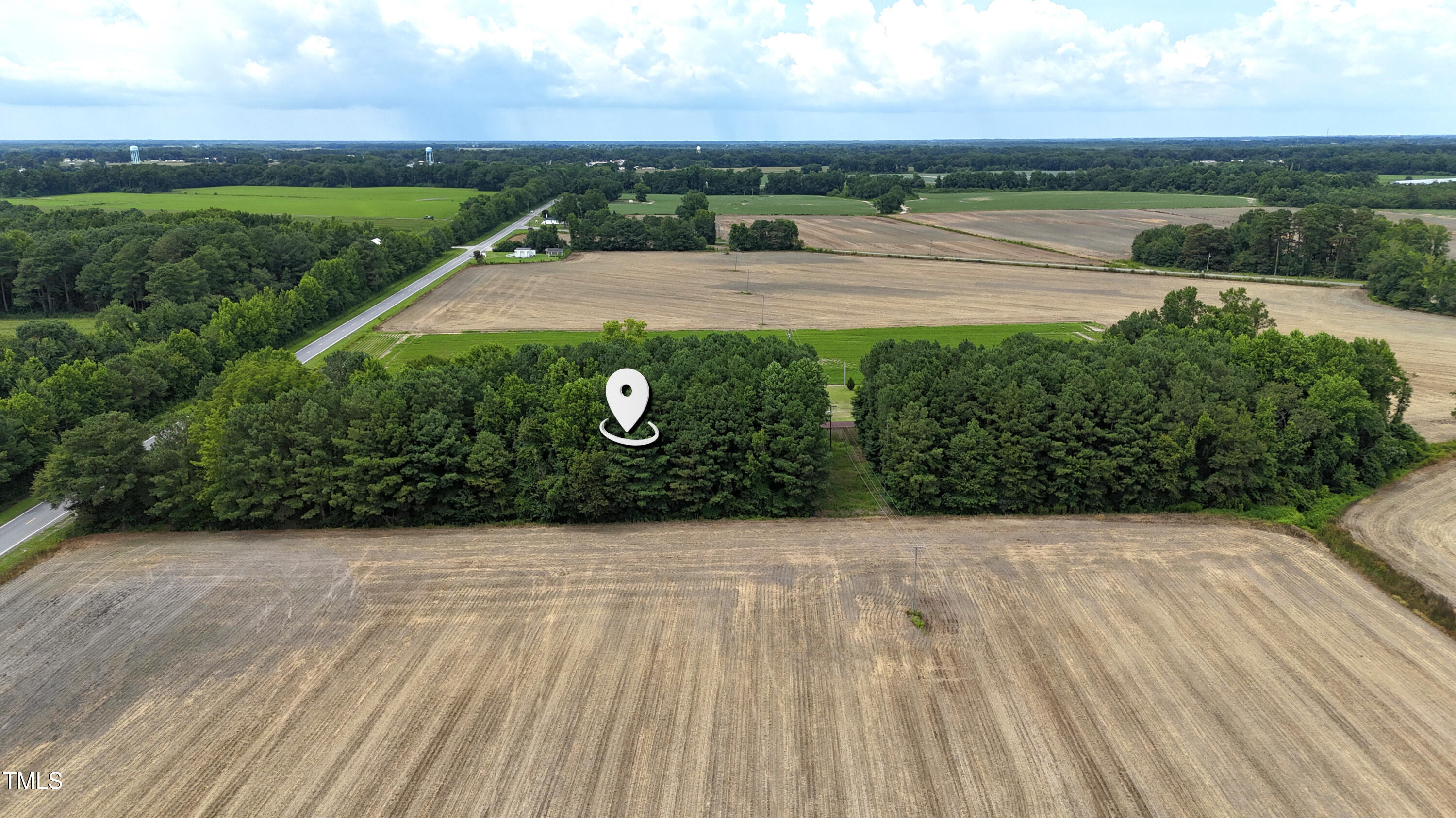 1620 Highway 50 Faison, NC 28341 - Photo 3 of 10 a view of a backyard with lawn chairs floor to ceiling window and ocean view