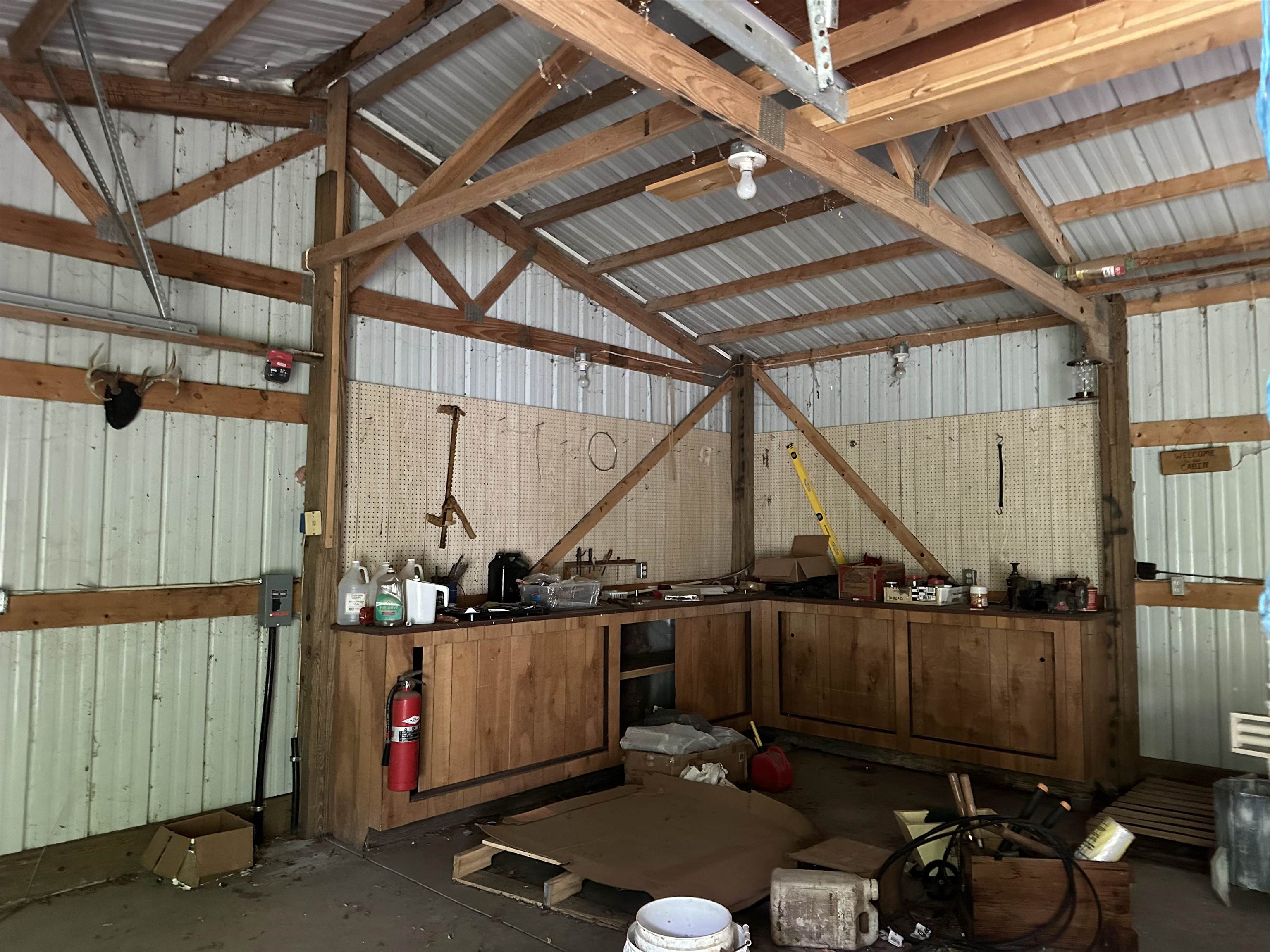 21040 Smit Road Morrison, IL 61270 - Photo 11 of 16 a room with lots of wooden furniture