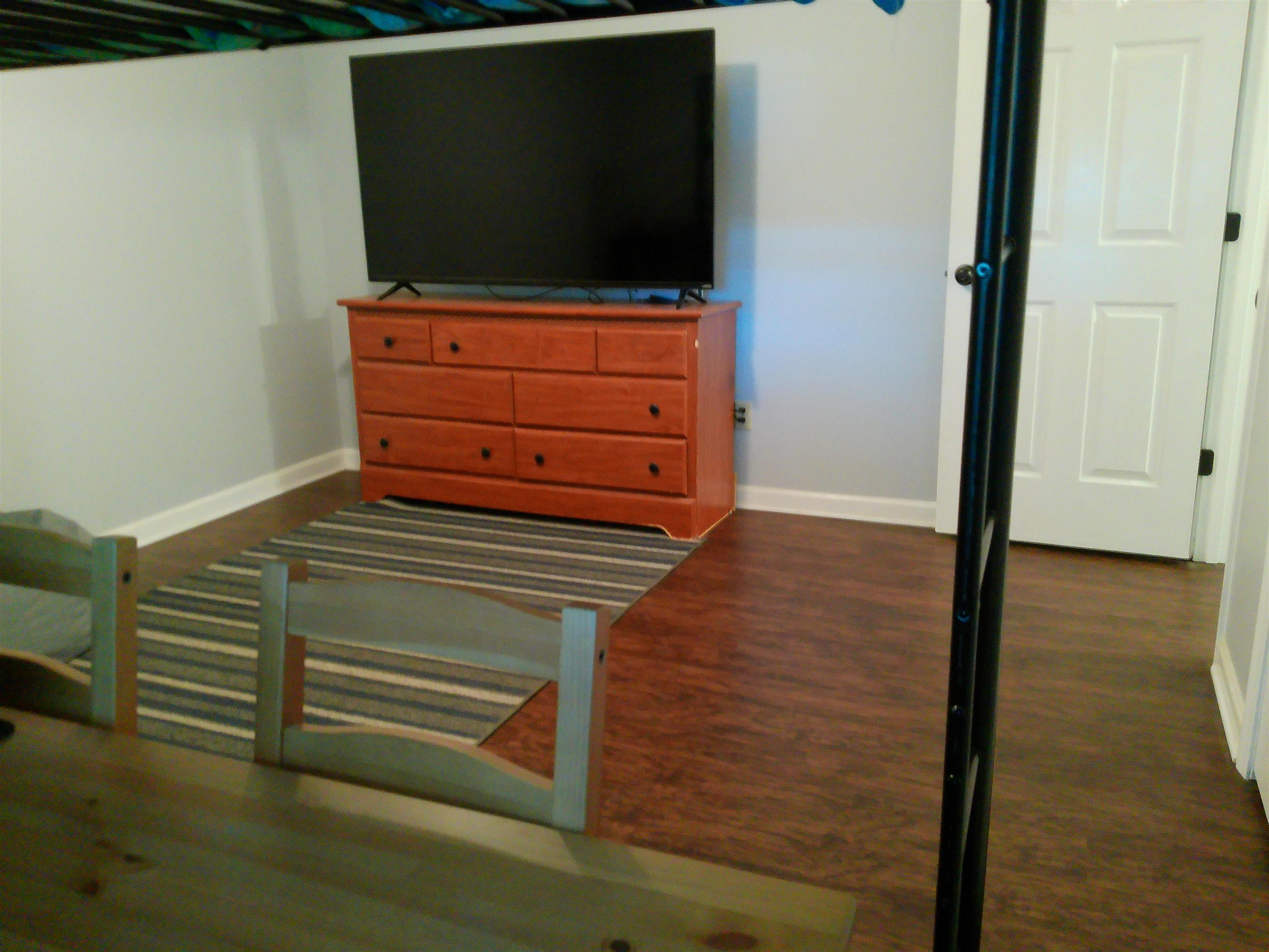 336 Pwr Loop Munford, TN 38058 - Photo 14 of 24 Bedroom with dark hardwood / wood-style floors