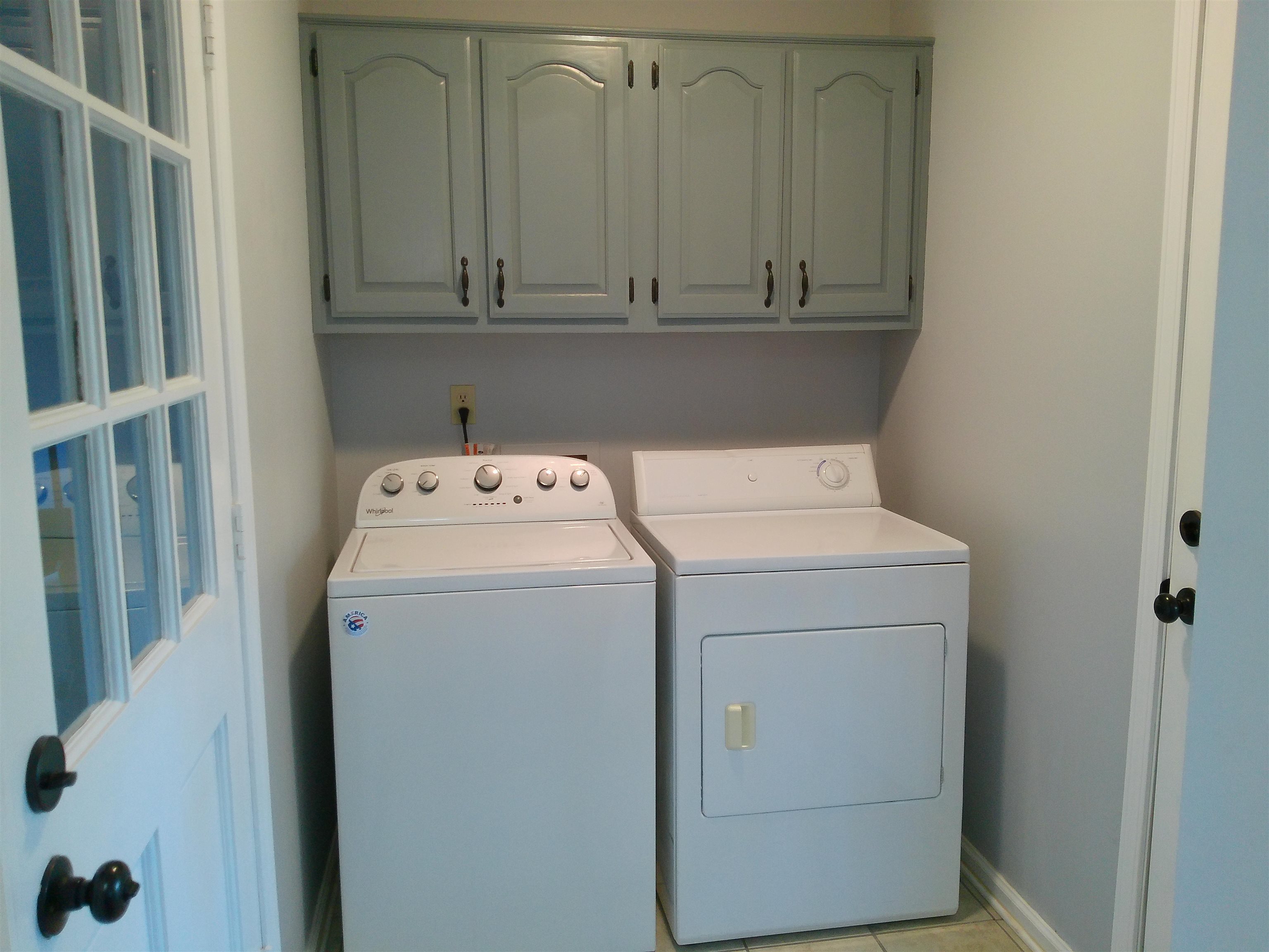 336 Pwr Loop Munford, TN 38058 - Photo 7 of 24 Clothes washing area featuring cabinets, independent washer and dryer, and light tile patterned floors