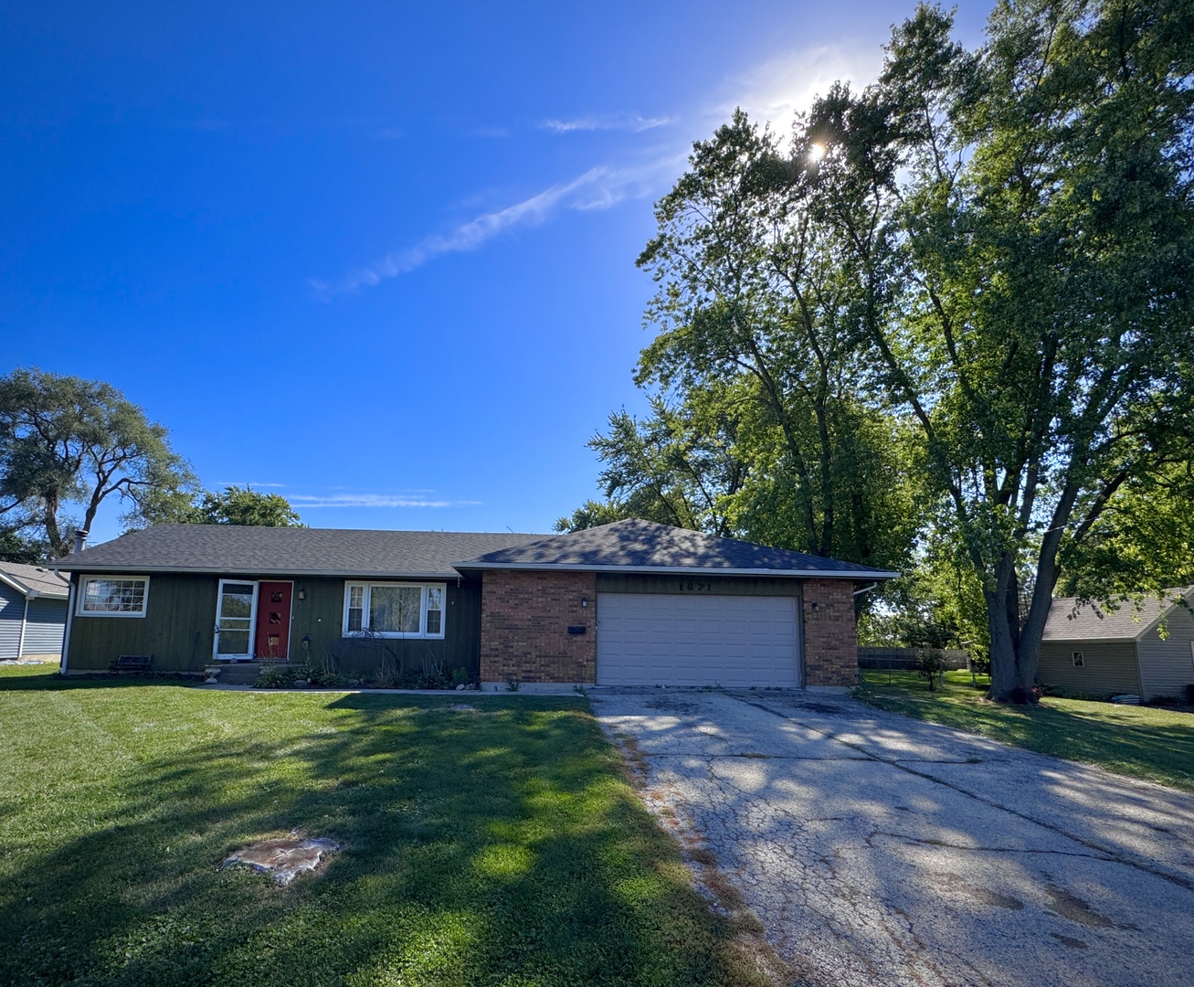 1671 Sheffer Road Aurora, IL 60505 - Photo 1 of 1 a view of a house with a yard