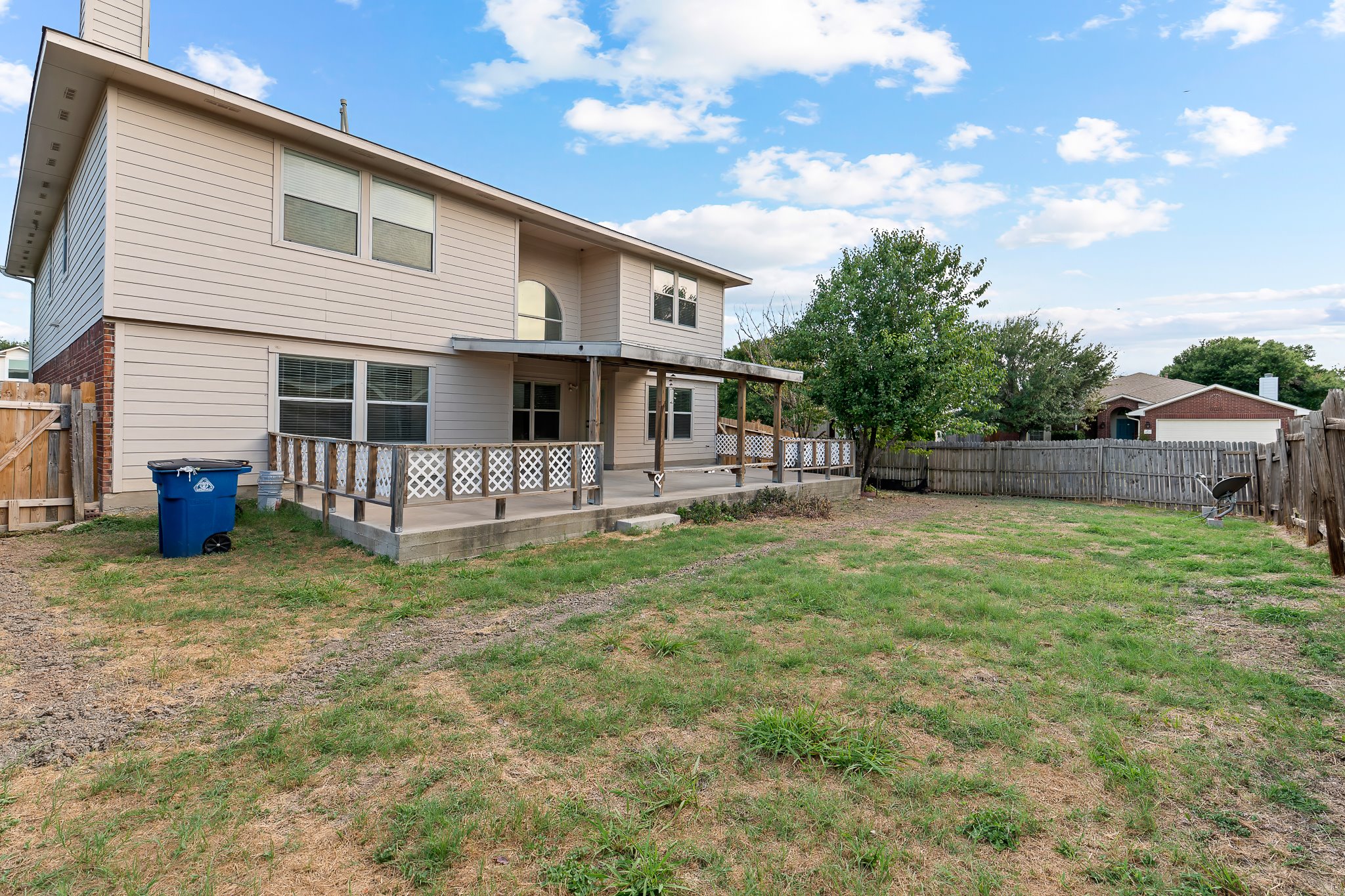 6700 Tulloch Way Austin, TX 78754 - Photo 39 of 39 a view of a house with backyard and a tree