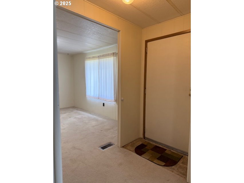 1125 58th Street, Unit 77 Springfield, OR 97478 - Photo 17 of 22 a view of a room with utility room