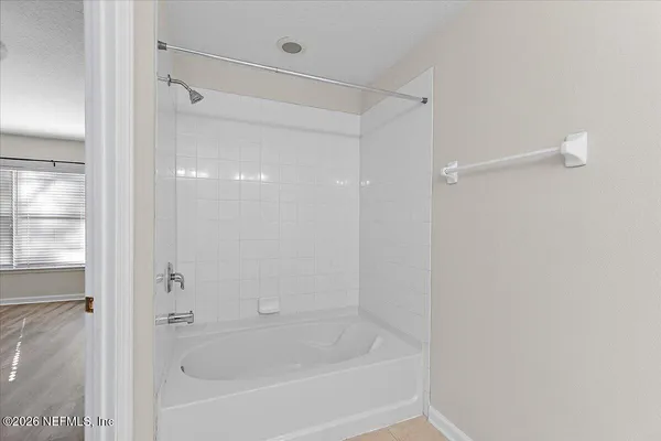 a close view of a bathtub in a bathroom