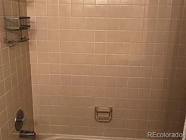 4292 South Salida Way, Unit 7 Aurora, CO 80013 - Photo 13 of 14 a bathroom with a shower