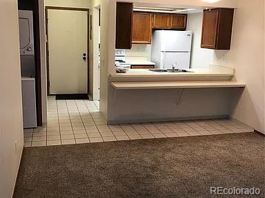 4292 South Salida Way, Unit 7 Aurora, CO 80013 - Photo 2 of 14 a bathroom with a sink and a mirror