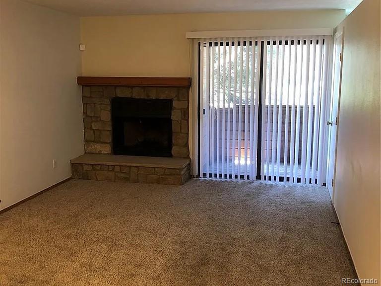 4292 South Salida Way, Unit 7 Aurora, CO 80013 - Photo 3 of 14 an empty room with windows