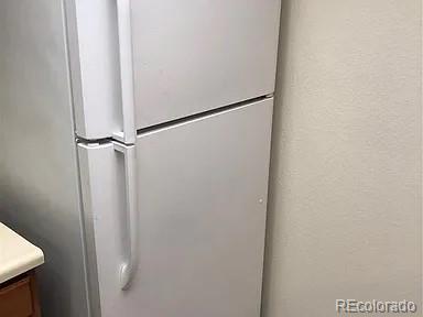 4292 South Salida Way, Unit 7 Aurora, CO 80013 - Photo 8 of 14 a bathroom with a glass shower door