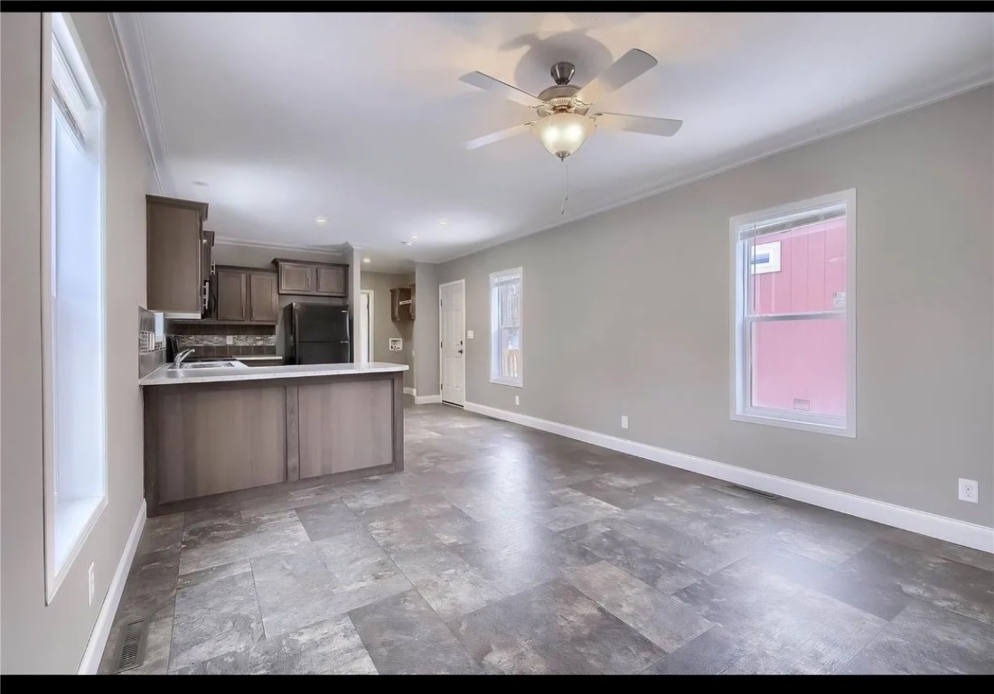 847 Airport Road Breckenridge, CO 80424 - Photo 2 of 17 a view of kitchen with kitchen island a sink appliances and cabinets