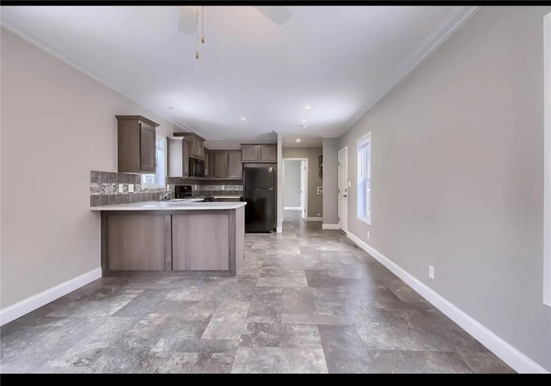 847 Airport Road Breckenridge, CO 80424 - Photo 5 of 17 a kitchen with stainless steel appliances granite countertop a stove a sink and a refrigerator