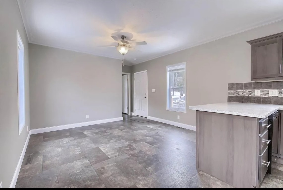 847 Airport Road Breckenridge, CO 80424 - Photo 9 of 17 a view of an empty room with a chandelier fan