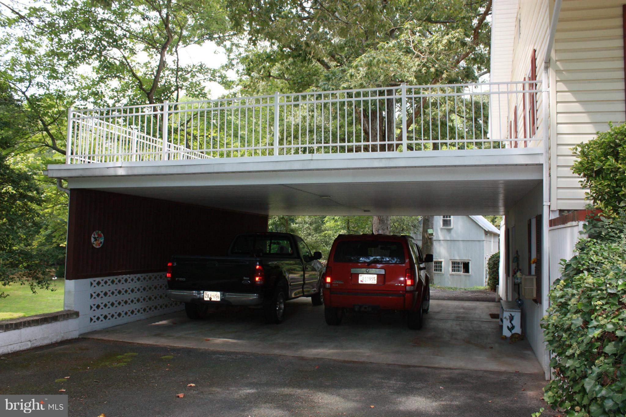 9020 Double Hills Road Denton, MD 21629 - Photo 29 of 30 Two vehicle carport with fenced patio above.